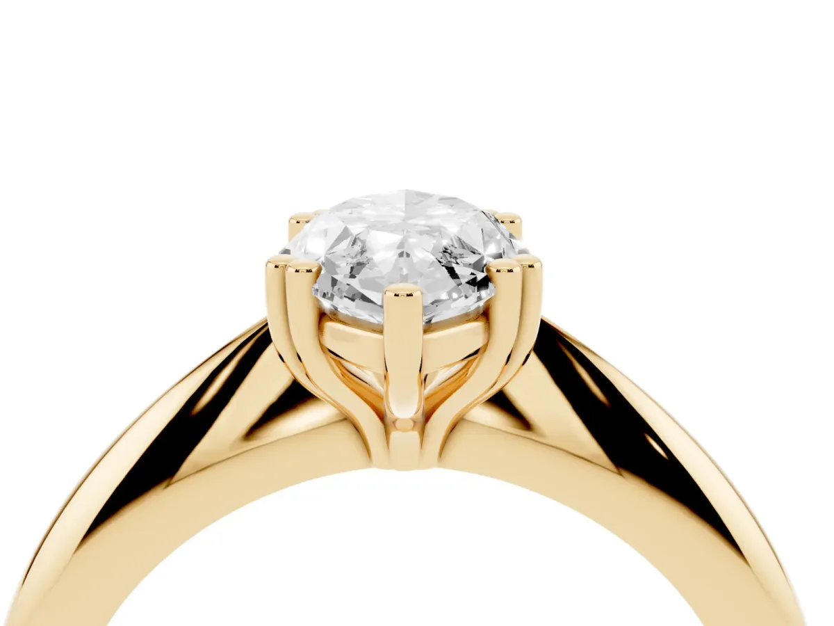 Marquise Cut Cut Solitaire Engagement Ring with Tapered Band and Four-Prong Setting Yellow gold