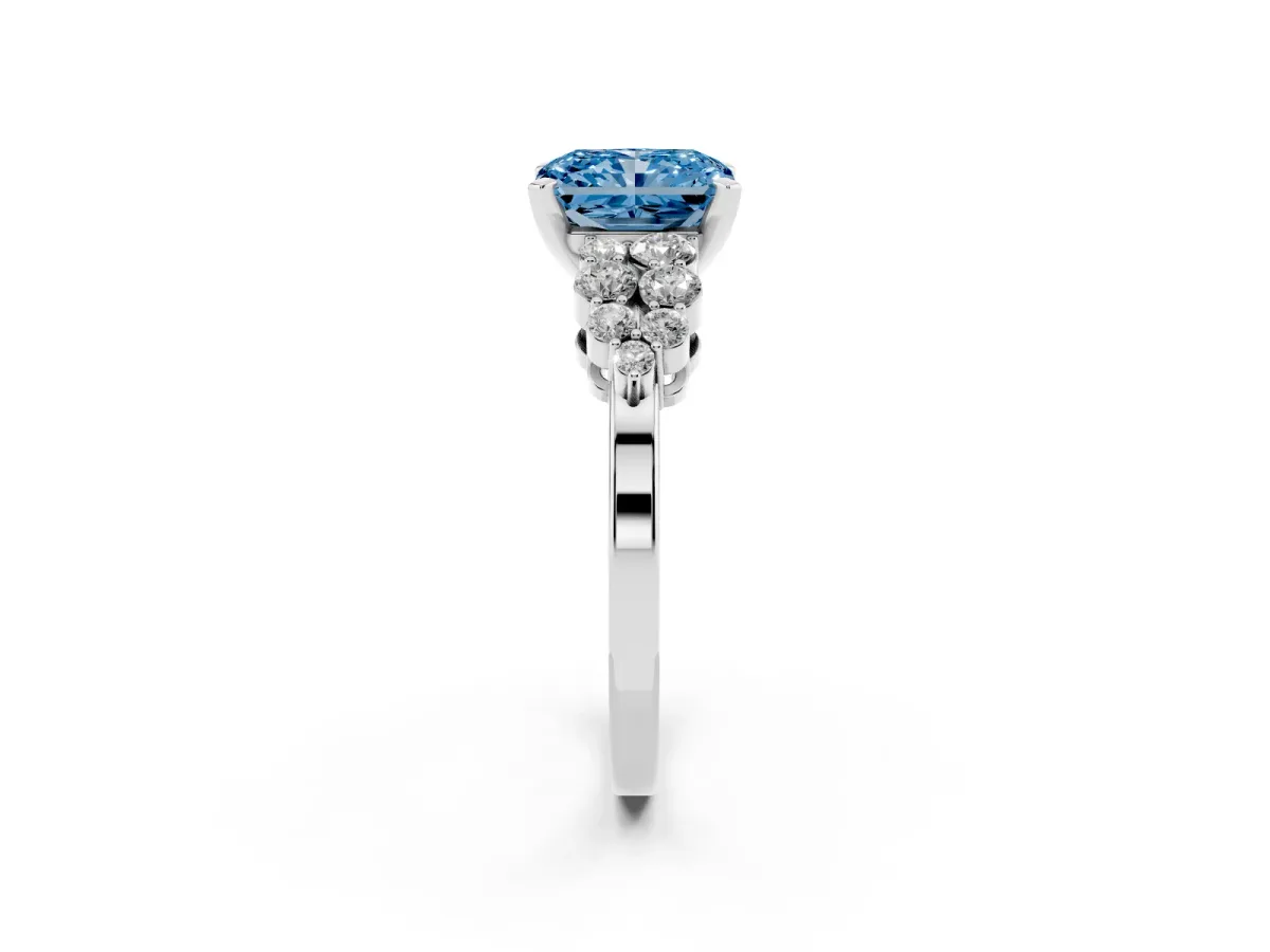 Fancy Blue Radiant Cut Cluster Diamond Engagement Ring with Pavé Band and Four-Prong Setting Silver