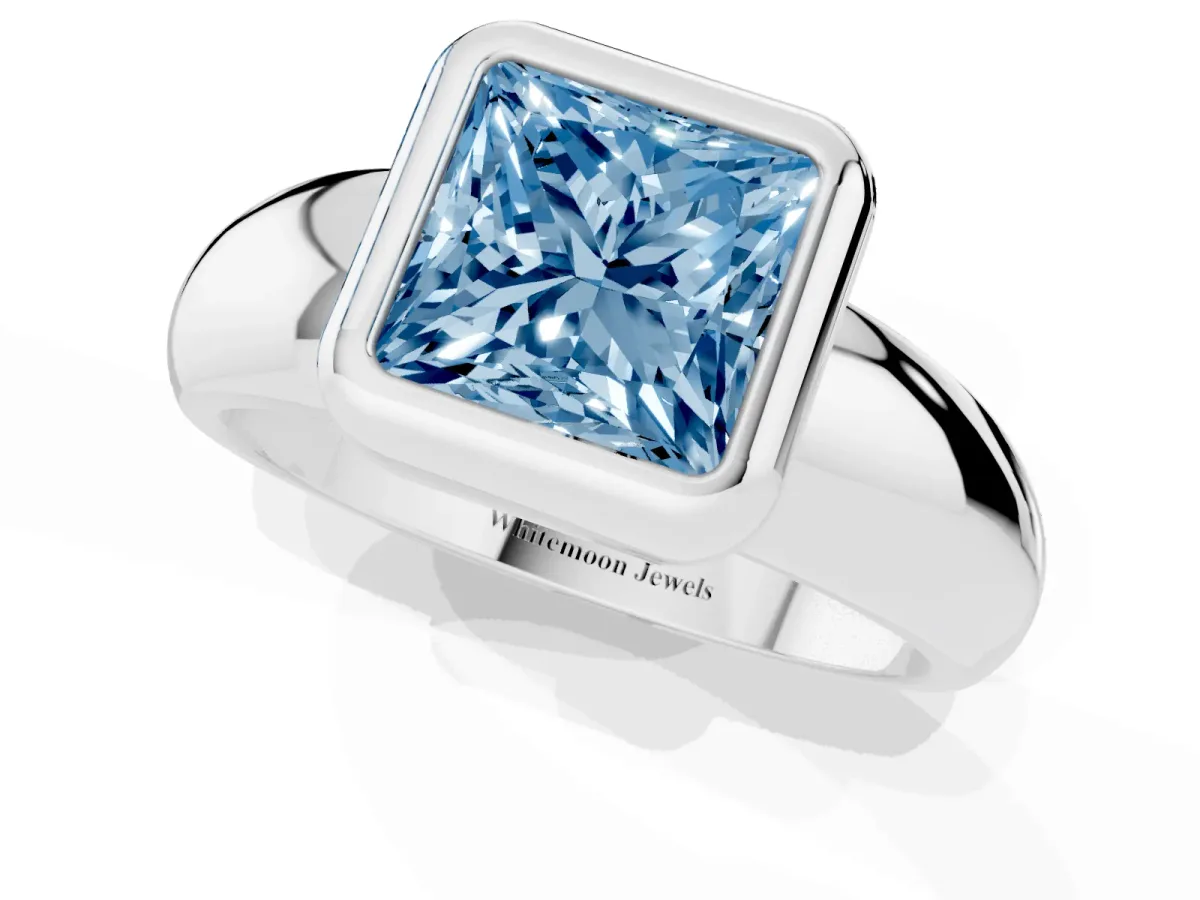 Fancy Blue Bezel Set Princess Cut Solitaire Ring with Wide Band Silver