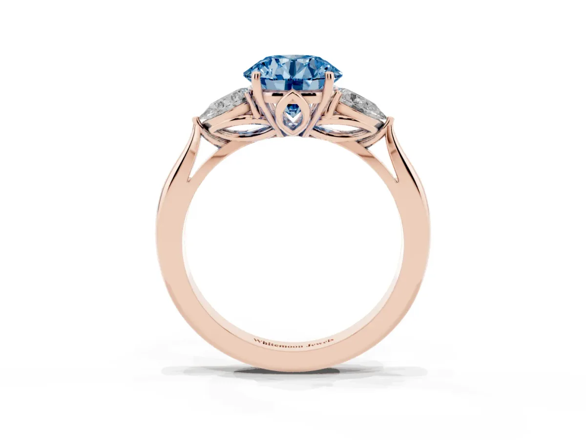 Fancy Blue Three-Stone Round Cut Brilliant Diamond Solitaire Ring with Tapered Band and Four-Prong Setting Rose gold