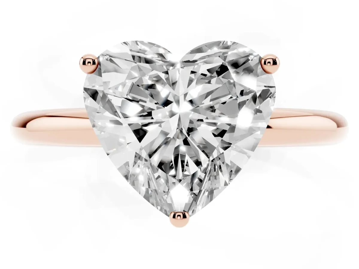 Heart Cut Cut Solitaire Engagement Ring with Four-Prong Setting and Classic Band Rose gold