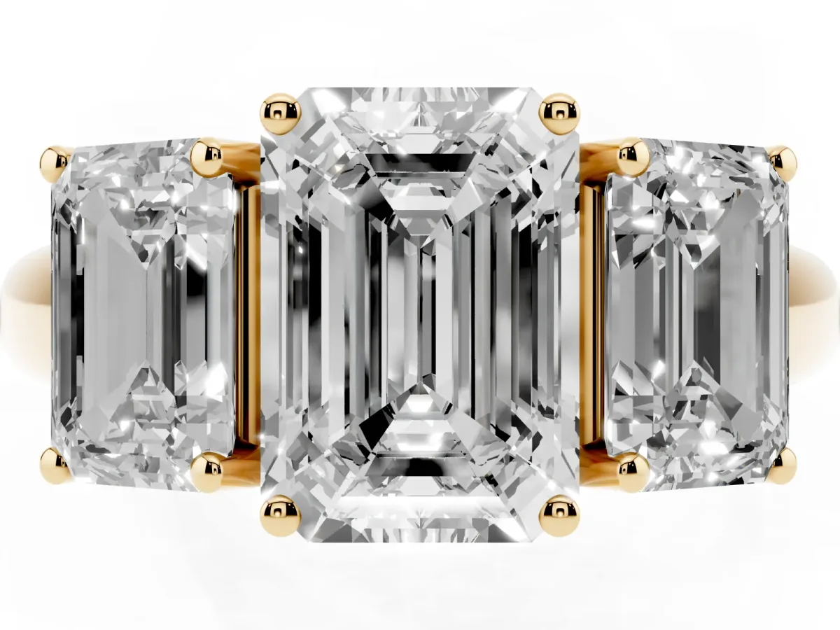 Three-Stone Emerald Cut Diamond Engagement Ring with Prong Setting Yellow gold