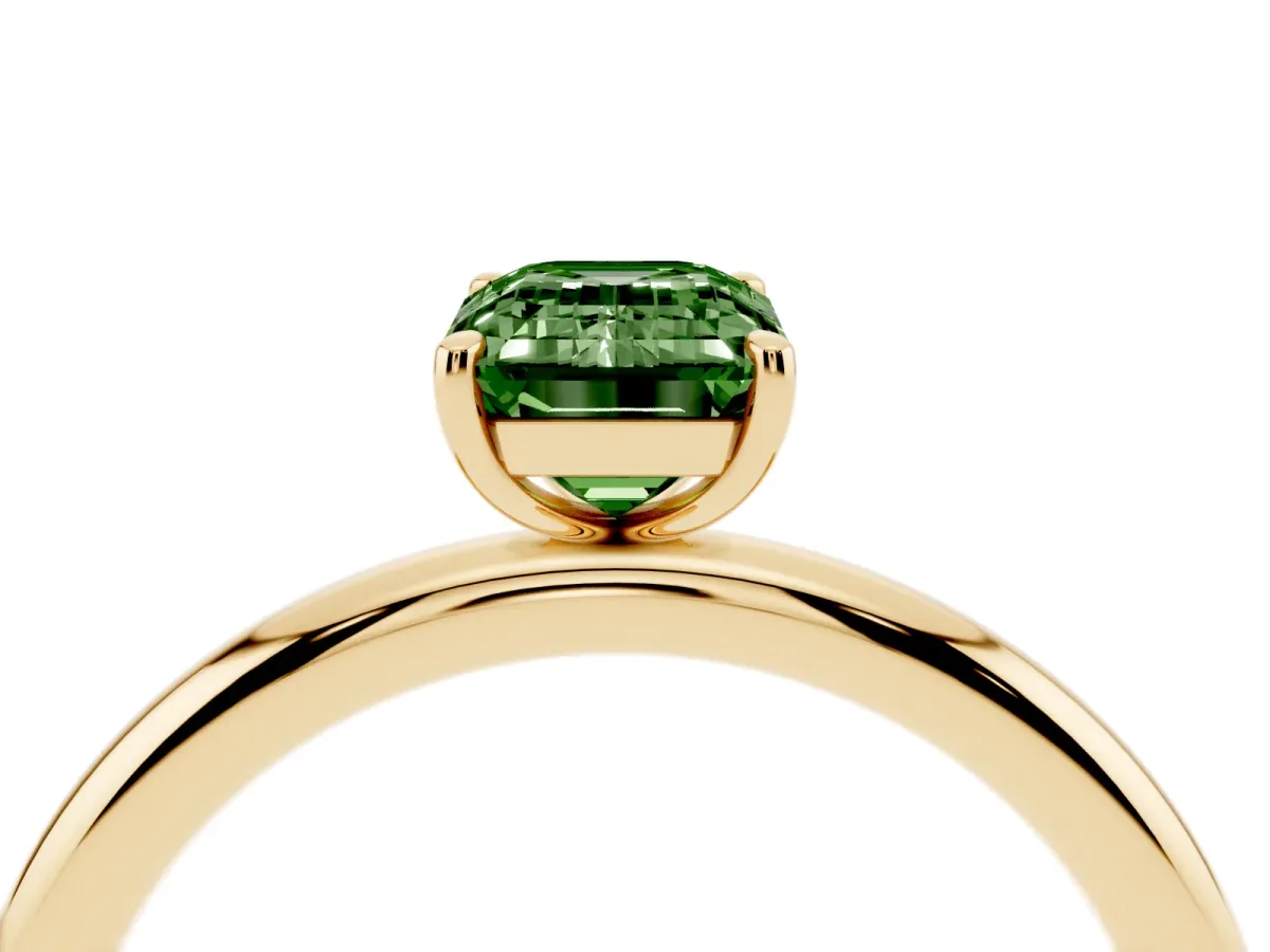 Fancy Green Emerald Cut Solitaire Diamond Ring with Four-Prong Setting on a Plain Band Yellow gold