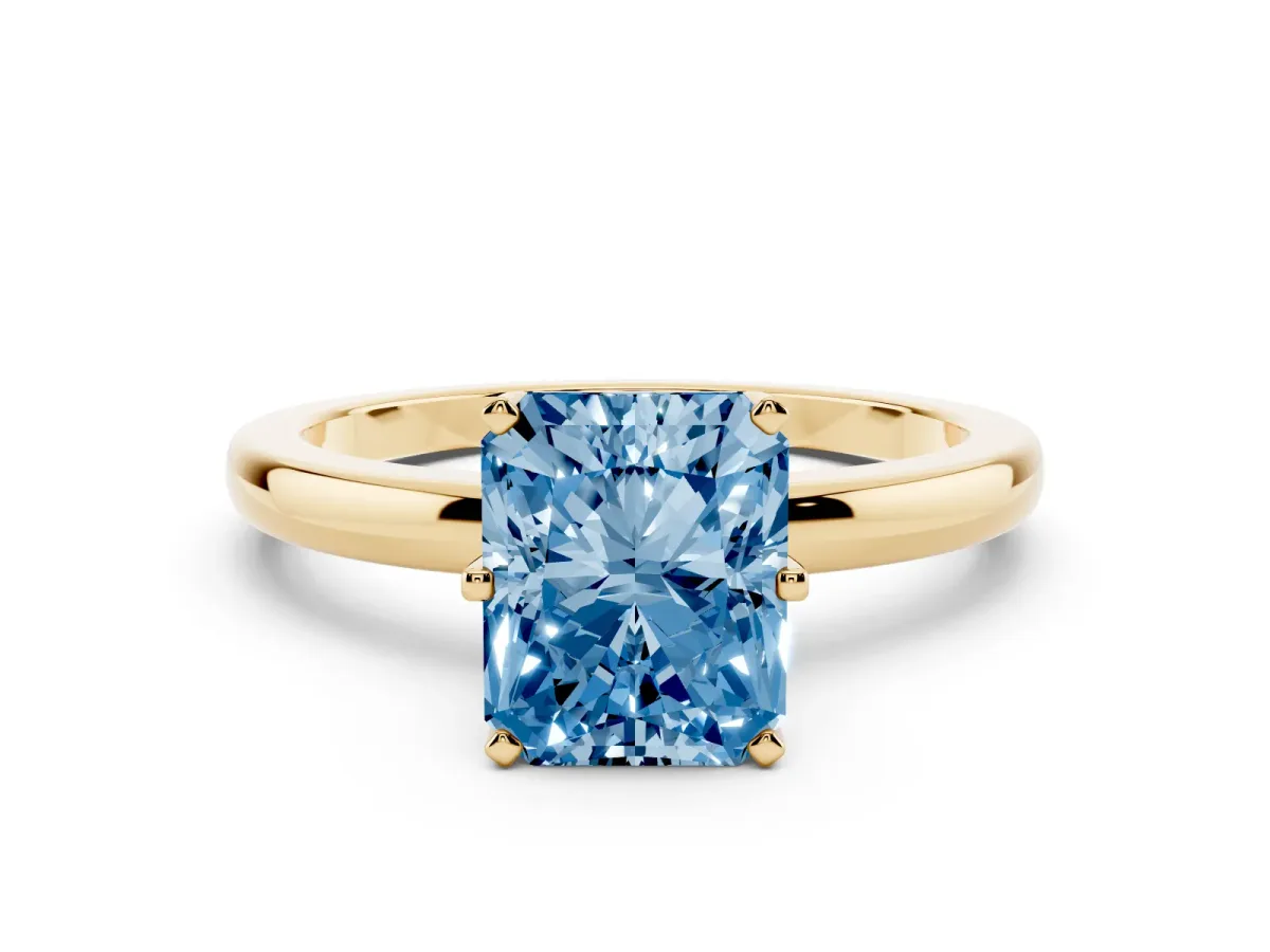 Fancy Blue Radiant Cut Solitaire Diamond Ring with Six-Prong Setting on a Classic Band Yellow gold