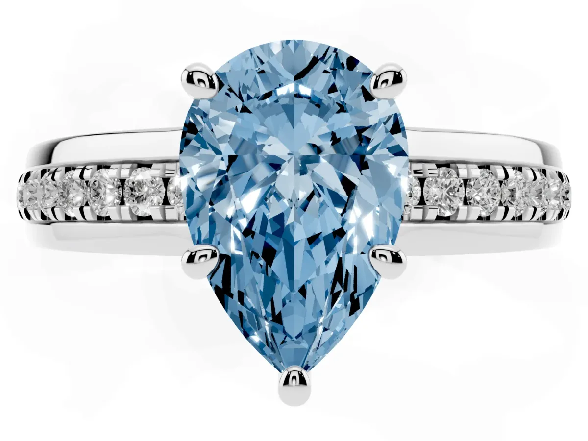 Fancy Blue Pear Cut Solitaire Diamond Ring with Channel Set Band and Six-Prong Setting Silver
