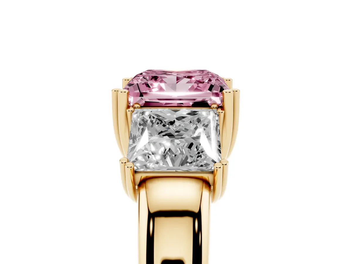 Fancy Pink Three-Stone Princess Cut Cut Diamond Ring with Channel Set Band and Four-Prong Setting Yellow gold