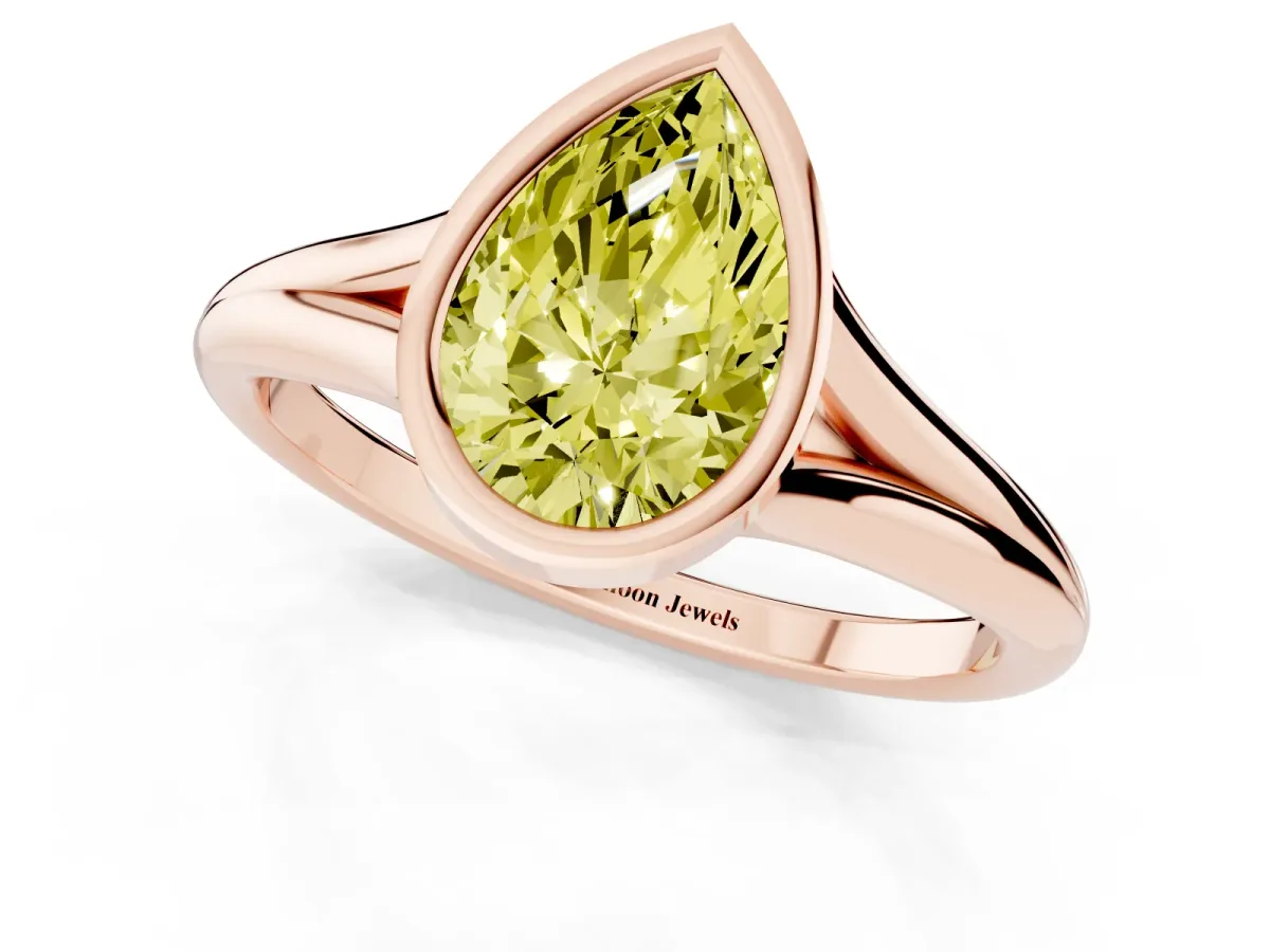 Fancy Yellow Bezel Set Pear Cut Cut Solitaire Ring with Tapered Band Rose gold