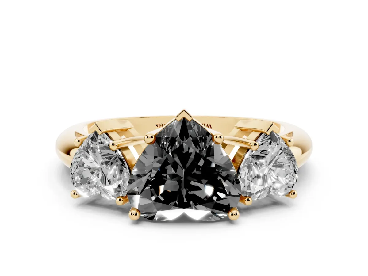 Fancy Black Three-Stone Heart Cut Cut Diamond Engagement Ring with Prong Setting on a White Gold Band Yellow gold