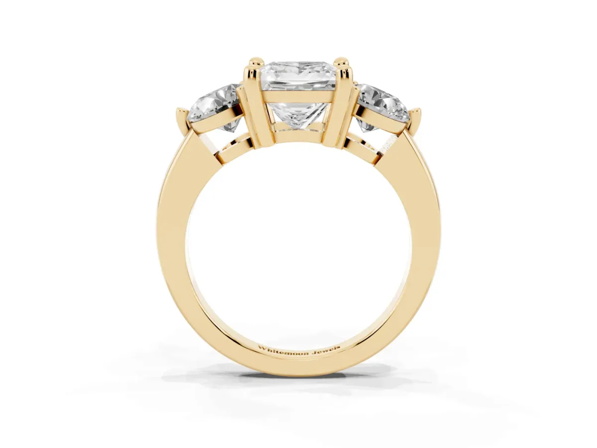 Three-Stone Princess Cut Brilliant Cut Solitaire Ring with Prong Setting on a Classic Band Yellow gold