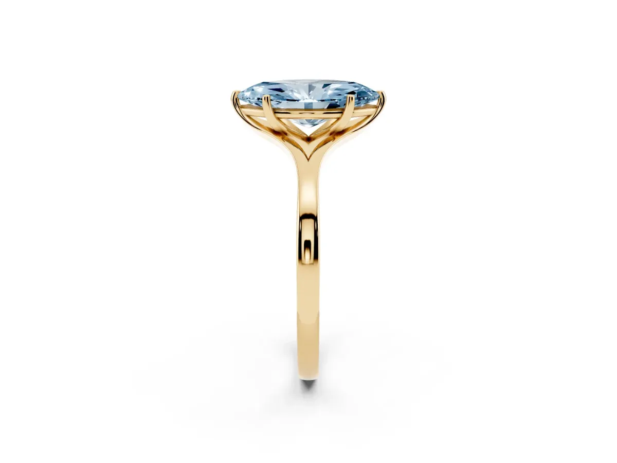 Fancy Blue Marquise Cut Solitaire Diamond Ring with Six-Prong Setting and Tapered Band Yellow gold