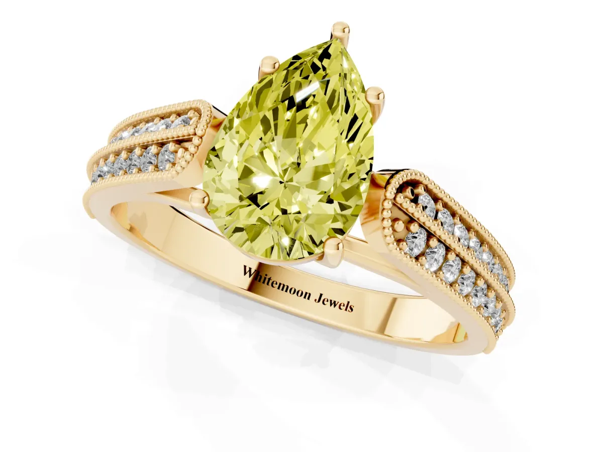Fancy Yellow Pear Cut Cut Pave Split Shank Engagement Ring with Four-Prong Setting Yellow gold