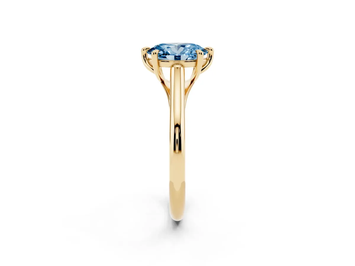 Fancy Blue Oval Cut Solitaire Engagement Ring with Six-Prong Setting and Classic Band Yellow gold