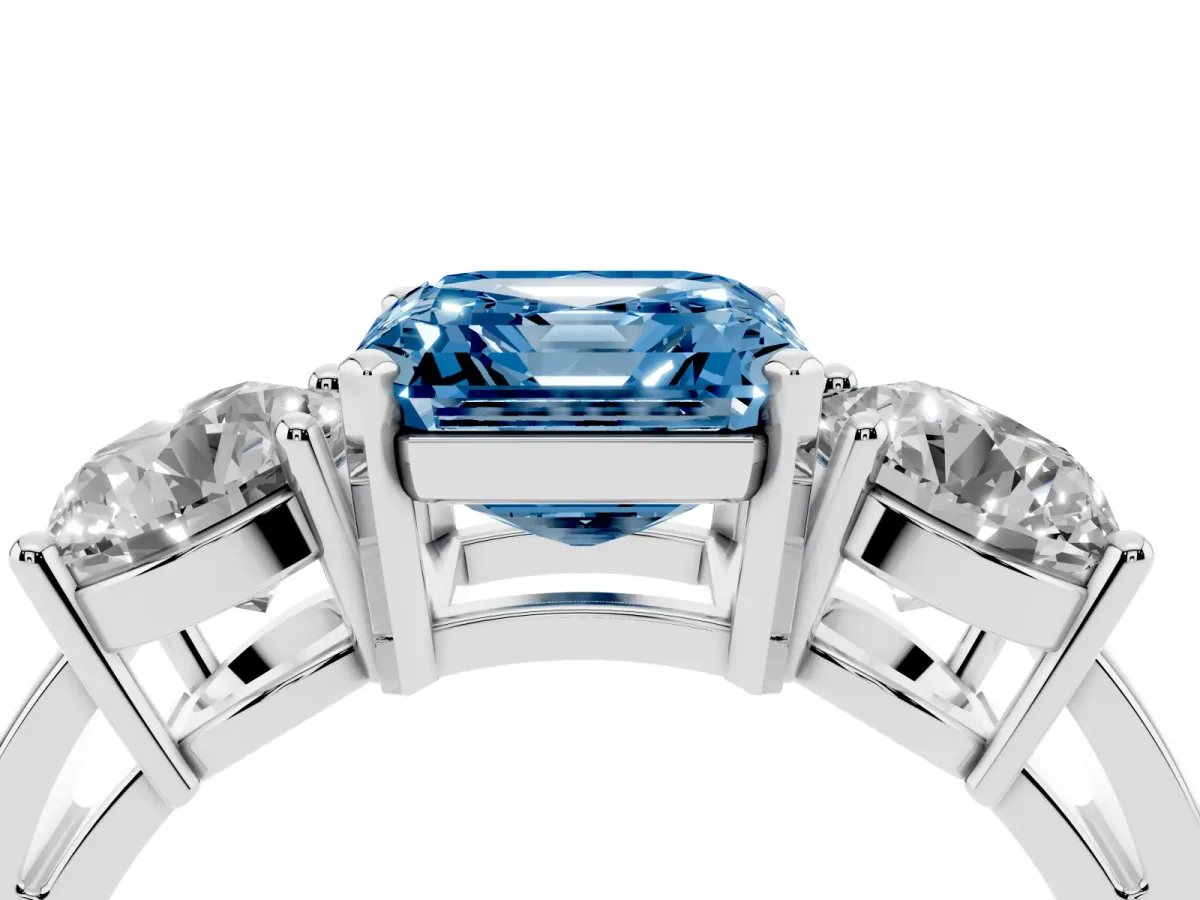 Fancy Blue Three-Stone Asscher Cut Diamond Ring with Round Side Stones, Classic Band, and Four-Prong Setting White gold