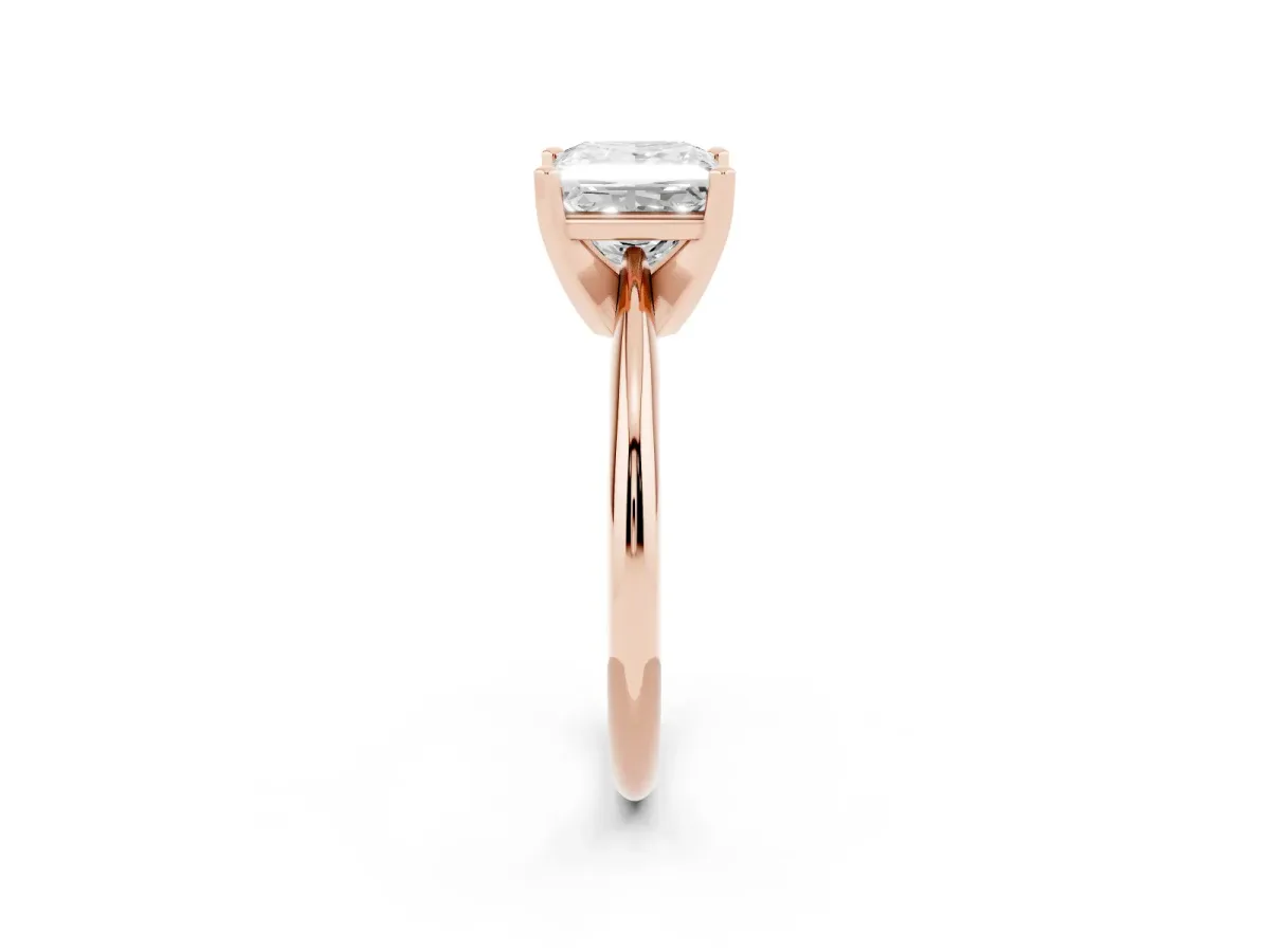 Princess Cut Cut Solitaire Ring with Four-Prong Setting on a Classic Band Rose gold