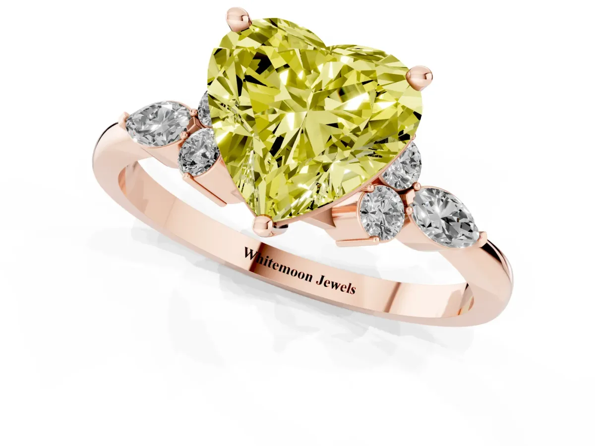 Fancy Yellow Heart Cut Brilliant Diamond Solitaire Ring with Pear Side Stones and Four-Prong Setting Rose gold