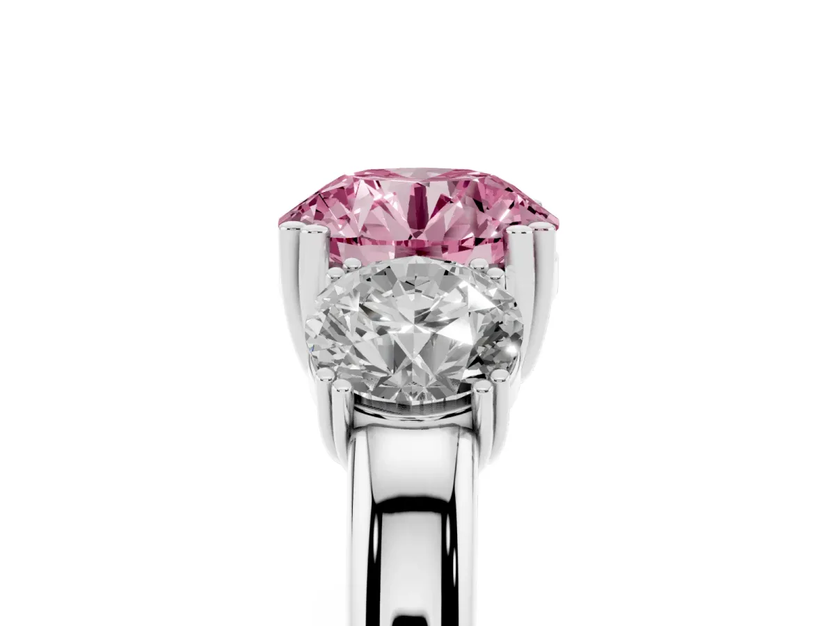 Fancy Pink Three-Stone Round Cut Cut Diamond Ring with Channel Set Band and Four-Prong Setting Silver