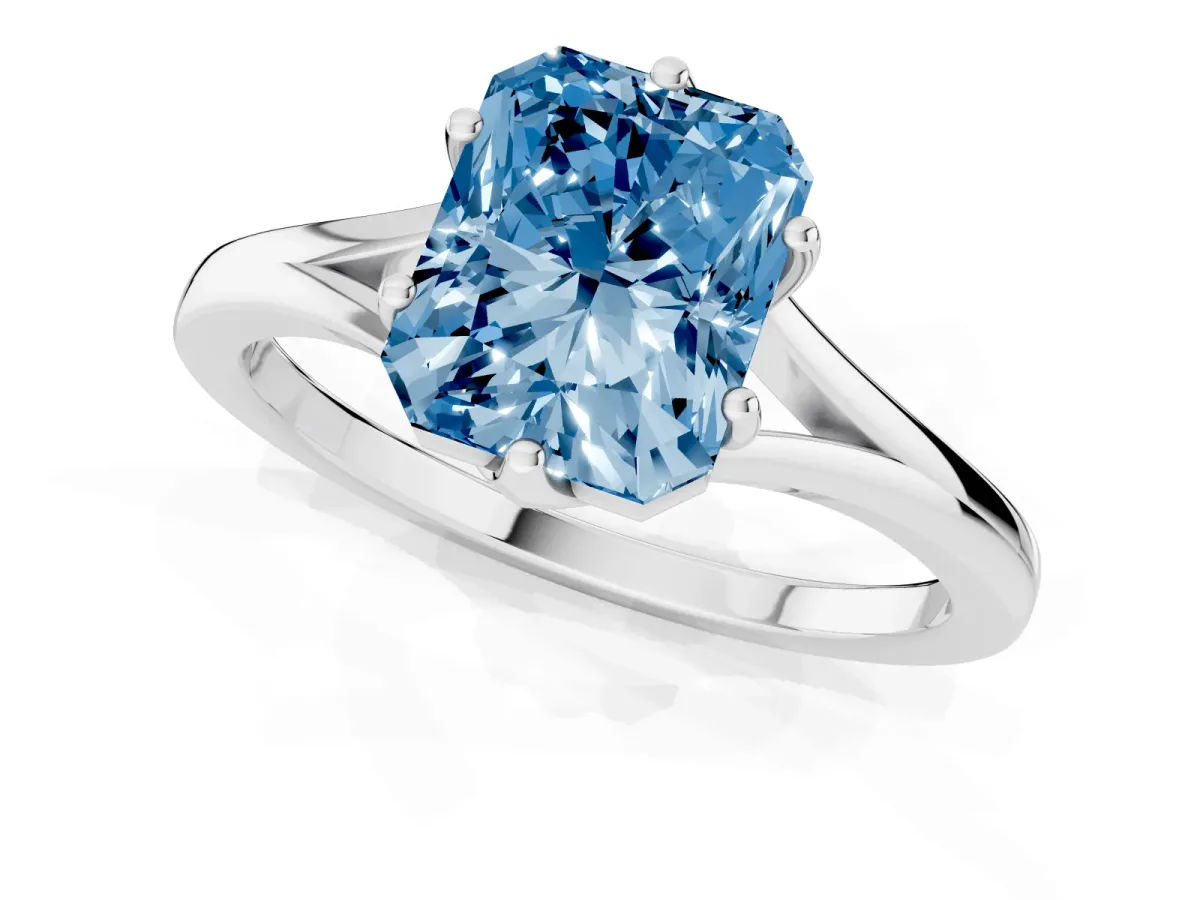 Fancy Blue Radiant Cut Solitaire Diamond Ring with Six-Prong Setting and Tapered Band Silver