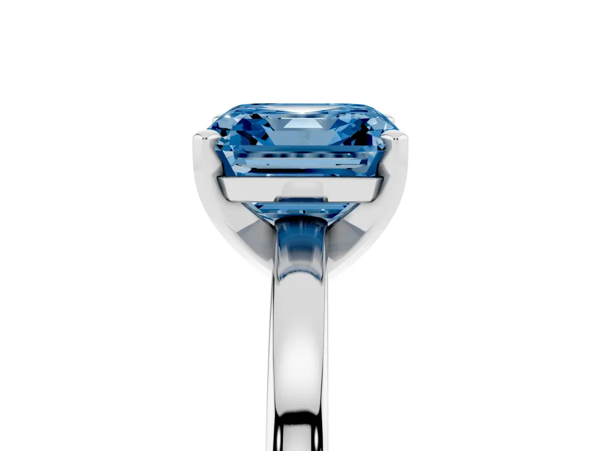 Fancy Blue Asscher Cut Solitaire Diamond Engagement Ring with Four-Prong Setting on a Classic Band Silver