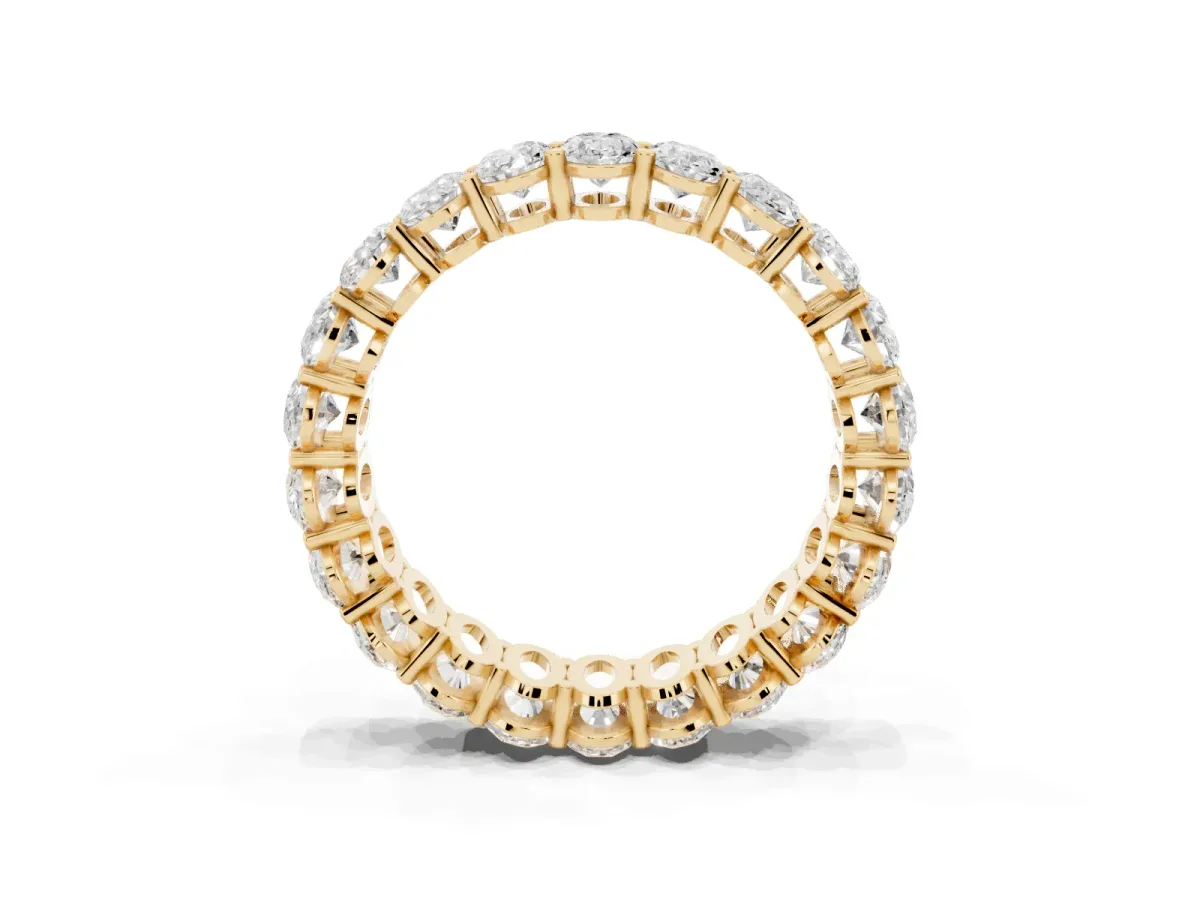 Oval Cut Diamond Eternity Band with Shared Prong Setting Yellow gold