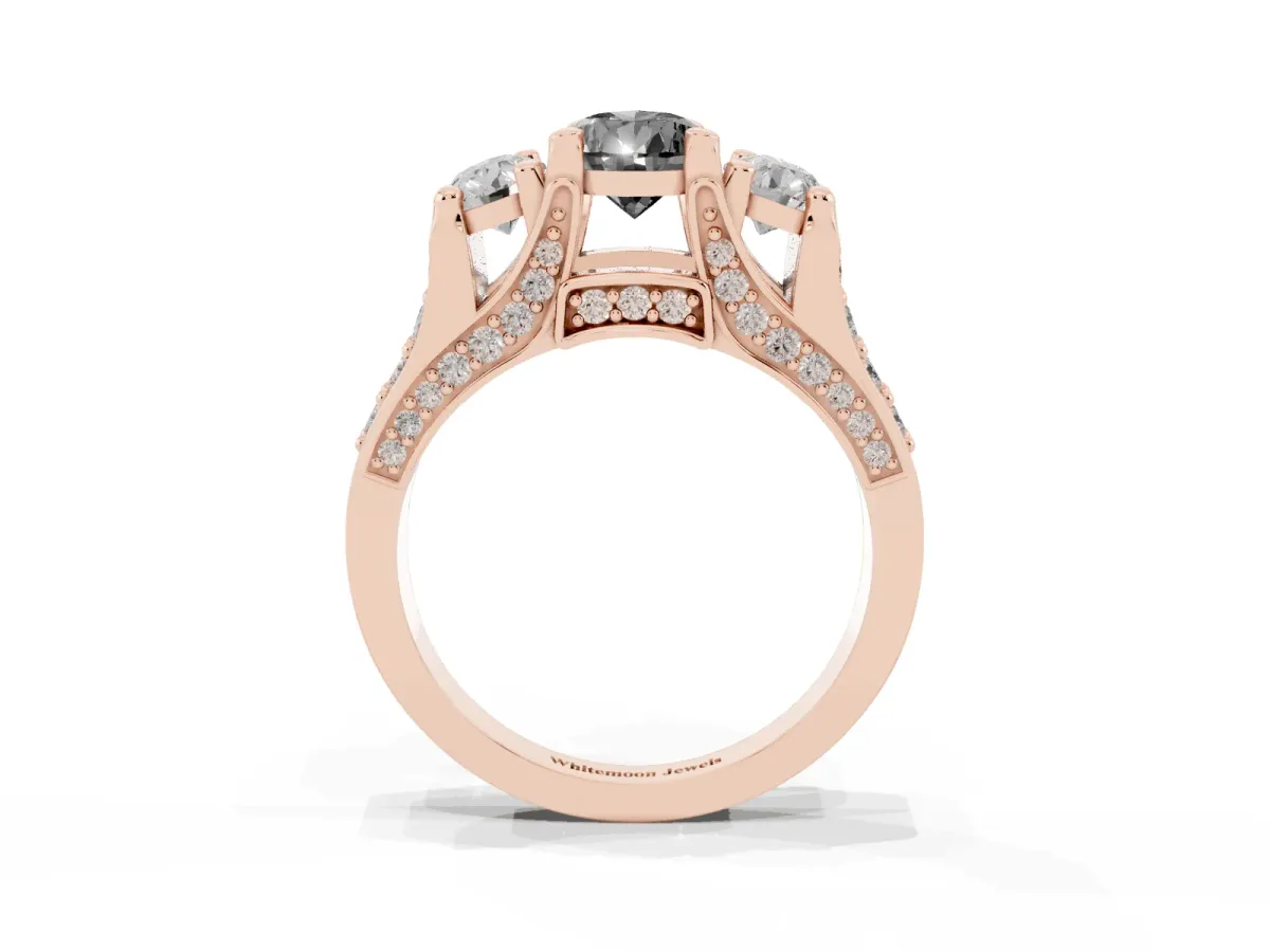 Fancy Black Pear Cut Diamond Three-Stone Ring with Channel Set Band and Four-Prong Setting Rose gold