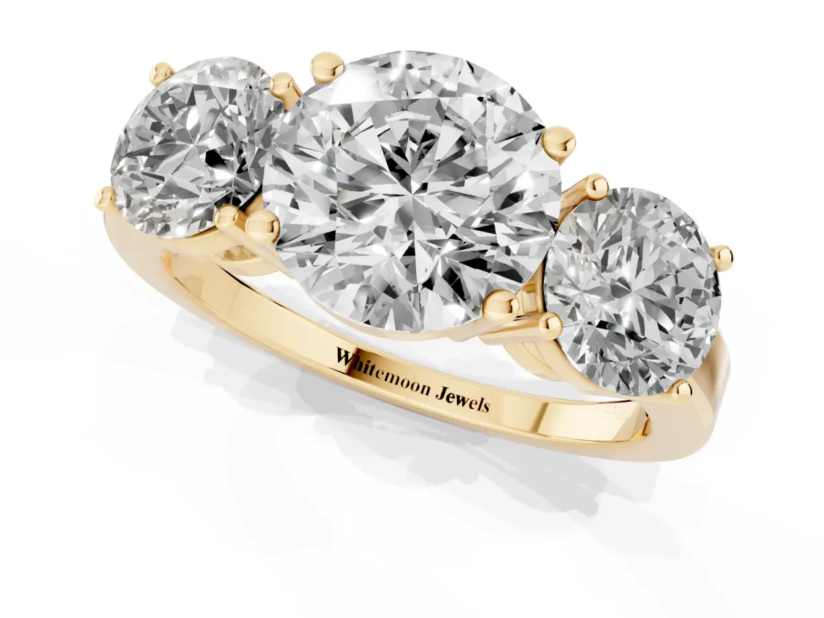 Three-Stone Round Cut Cut Diamond Engagement Ring with Flat Band and Four-Prong Setting Yellow gold