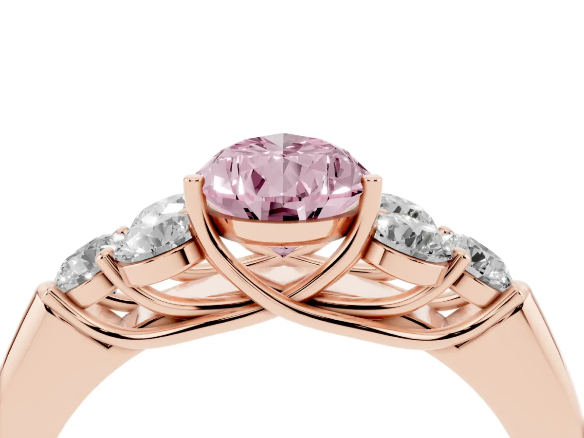 Fancy Pink Pear Cut Cut Diamond Cluster Ring with Round Accent Stones and Prong Setting on a Classic Band Rose gold