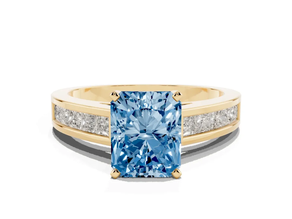Fancy Blue Radiant Cut Solitaire Diamond Ring with Channel-Set Band and Four-Prong Setting Yellow gold