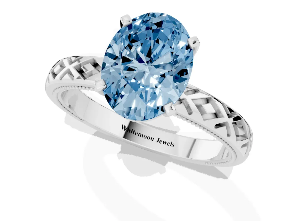 Fancy Blue Oval Cut Solitaire Diamond Ring with Milgrain and Black Enamel X Pattern Band Platinum