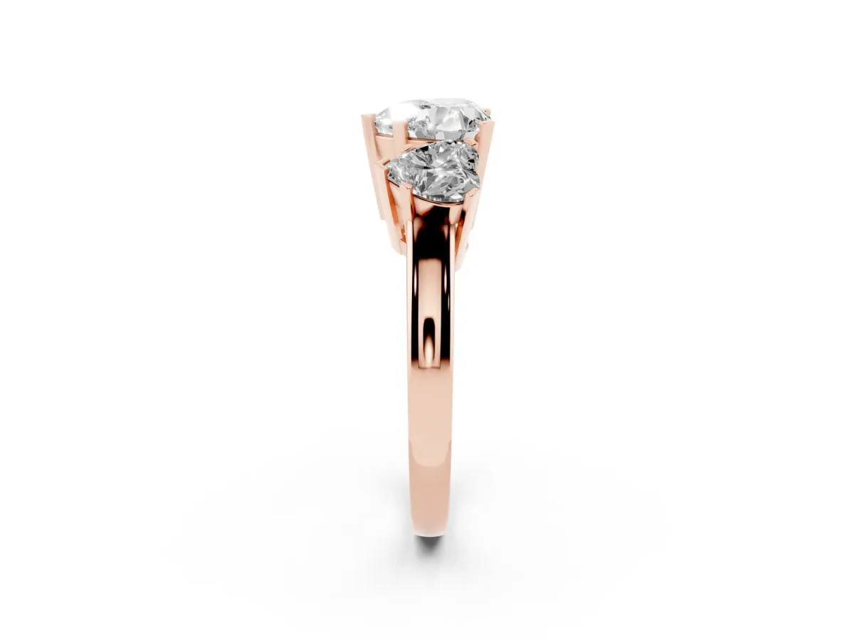 Three-Stone Heart Cut Cut Diamond Ring with Channel Set Band and Four-Prong Setting Rose gold