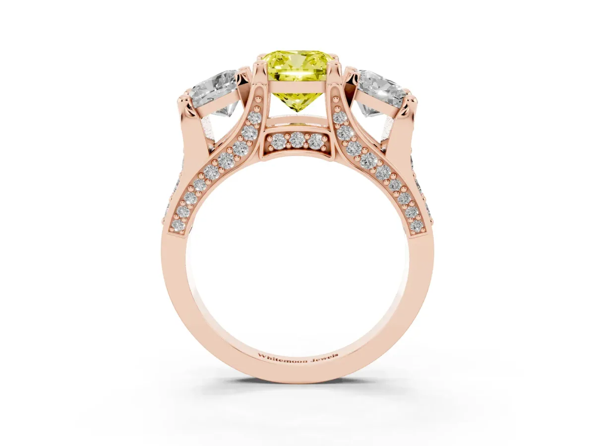 Fancy Yellow Cushion Cut Diamond Three-Stone Ring with Channel Set Band and Four-Prong Setting Rose gold