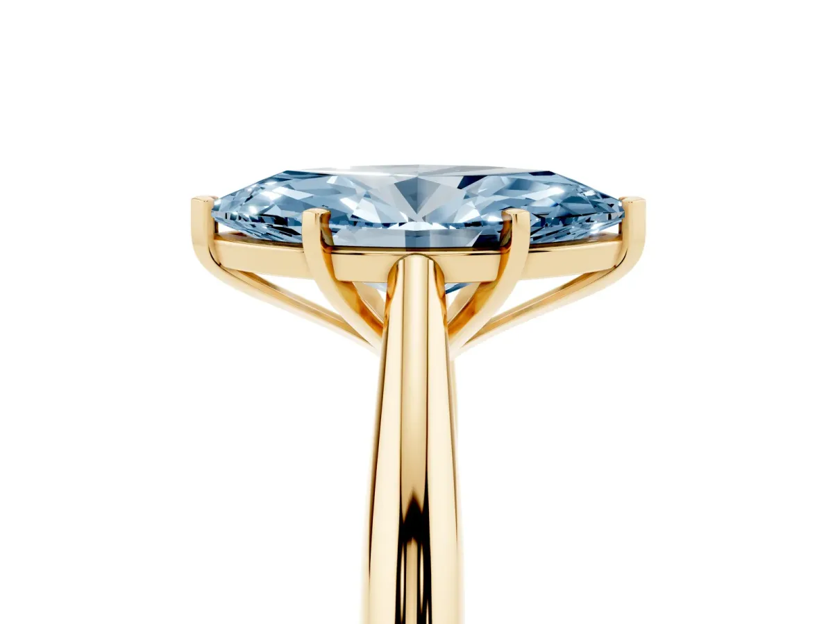 Fancy Blue Marquise Cut Diamond Solitaire Engagement Ring with Cathedral Setting and Four-Prong Mount Yellow gold