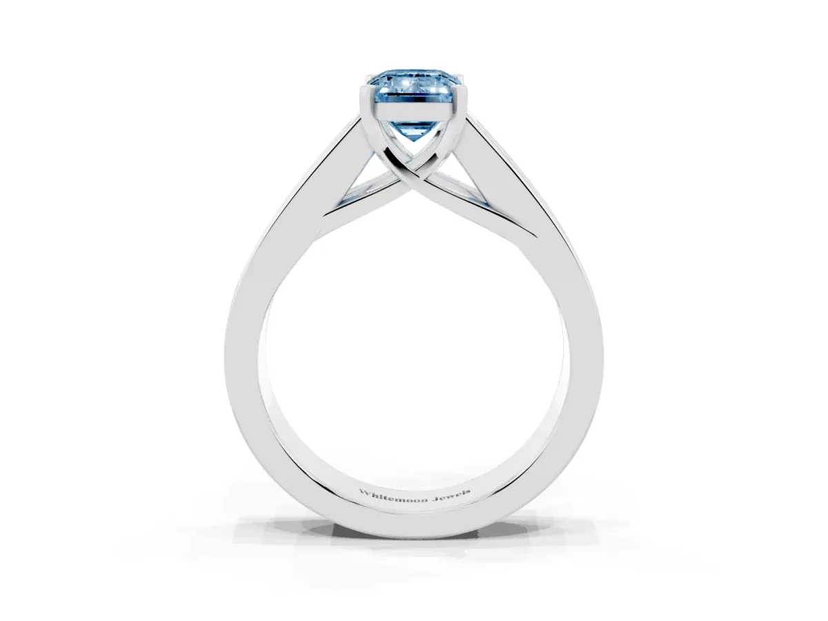 Fancy Blue Emerald Cut Cut Channel Set Solitaire Ring with Four-Prong Setting Platinum