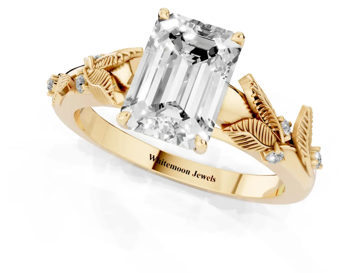 Emerald Cut Diamond Solitaire Ring with Leaf Motif Band and Four-Prong Setting Yellow gold