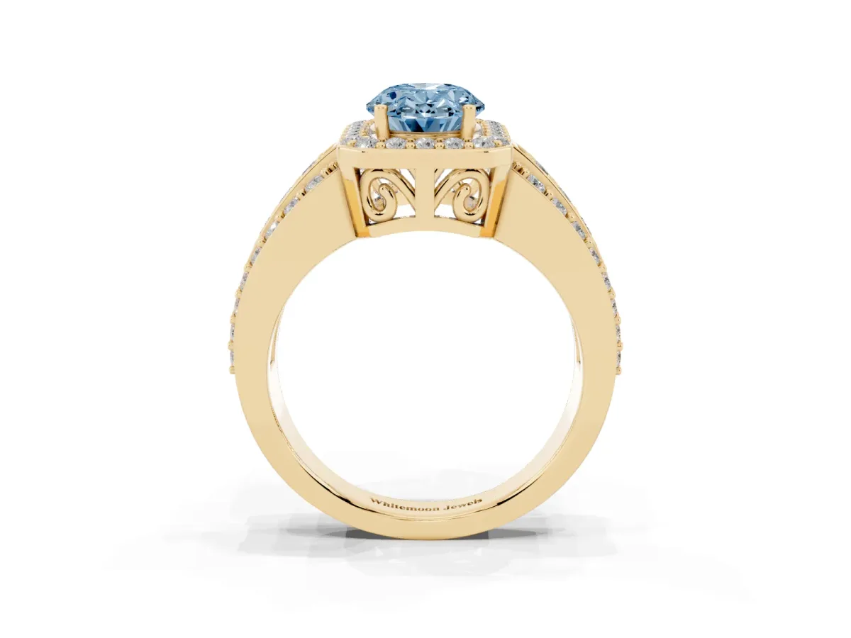 Fancy Blue Oval Cut Halo Diamond Ring with Round Split Shank and Prong Setting Yellow gold