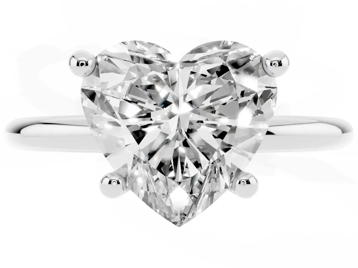 Heart Cut Solitaire Diamond Ring with 4-Prong Setting on a Classic Band Silver