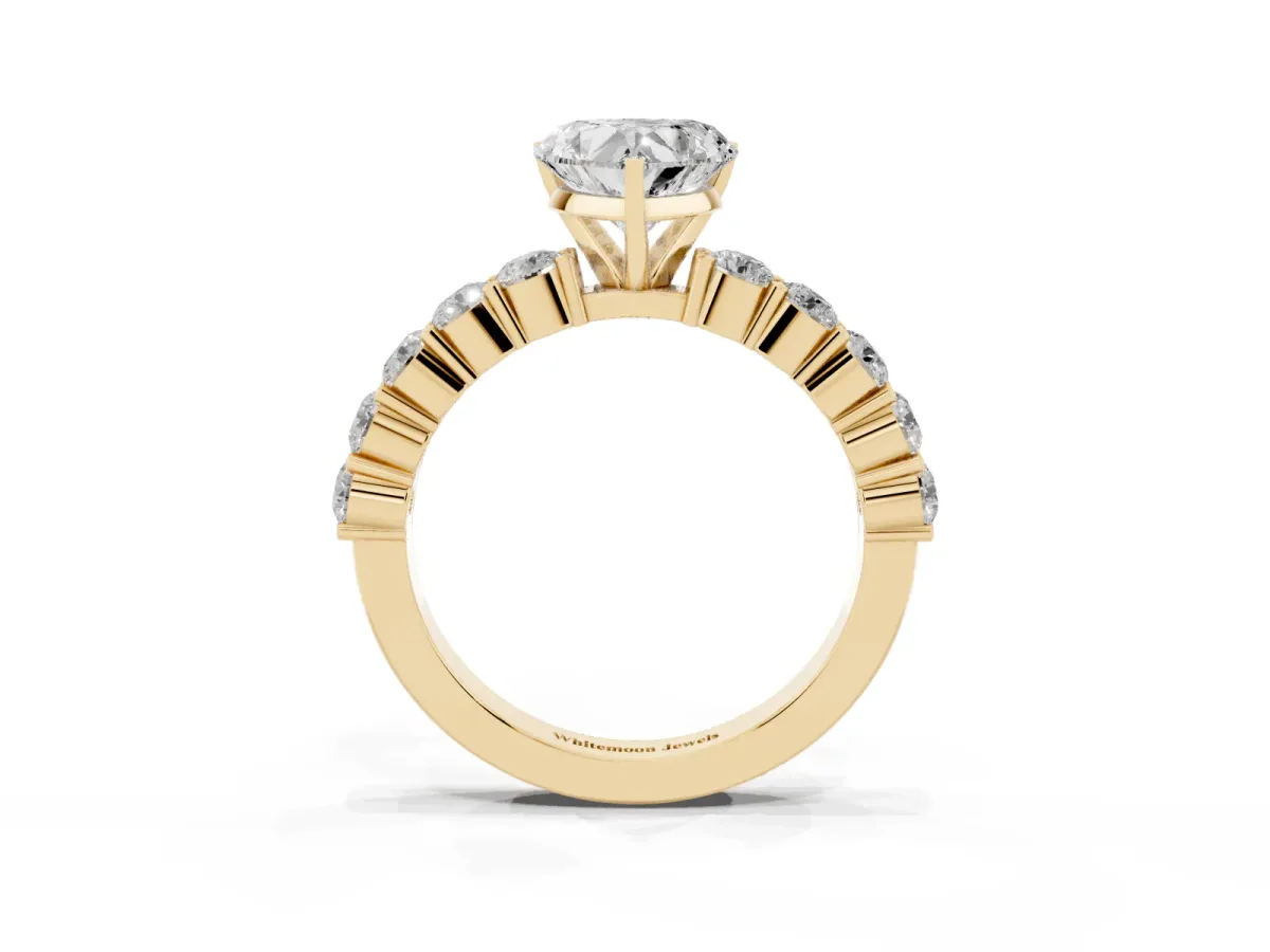 Heart Cut Diamond Solitaire Ring with Shared Prong Round Side Stones Yellow gold