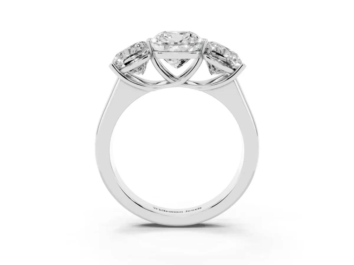 Cushion Cut Three-Stone Diamond Ring with Prong Setting on a Classic Band Silver