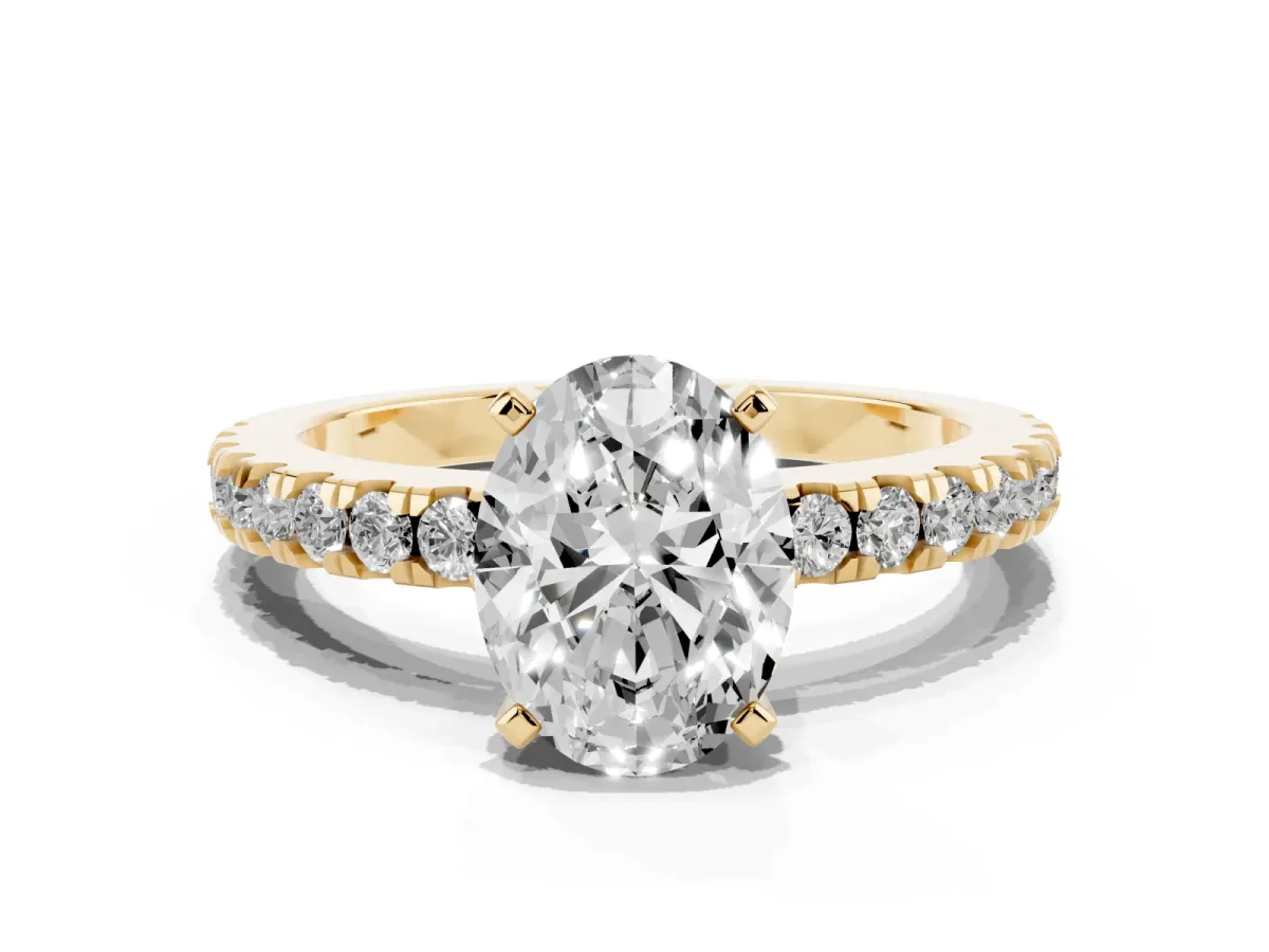 Oval Cut Solitaire Diamond with Pavé Band and Four-Prong Setting Yellow gold