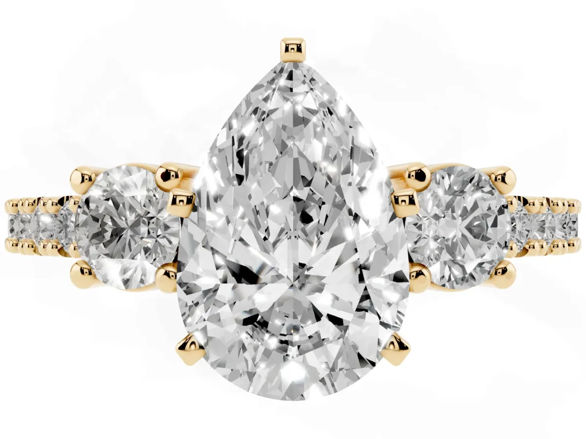 Pear Cut Three-Stone Diamond Pavé Band with Prong Setting Yellow gold