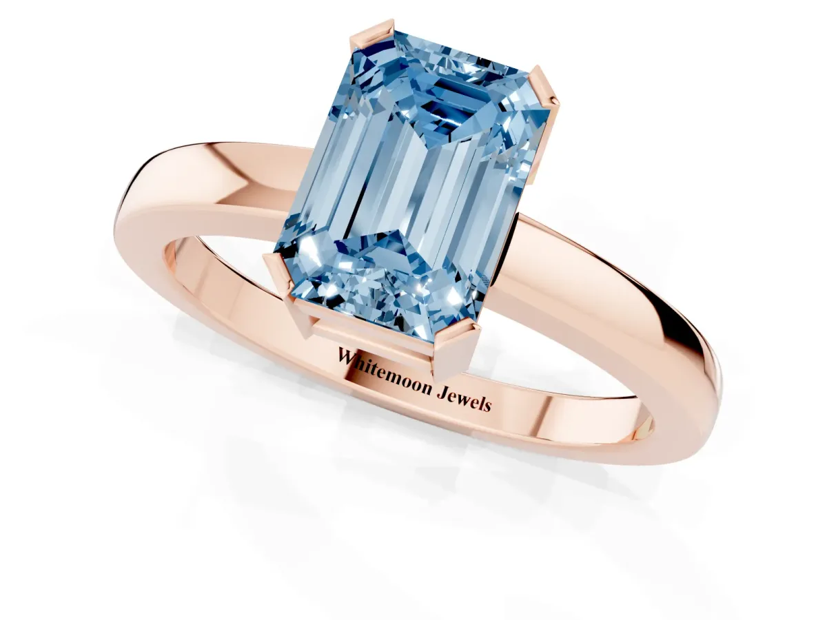 Fancy Blue Emerald Cut Cut Solitaire Ring with Four-Prong Setting and Classic Band Rose gold