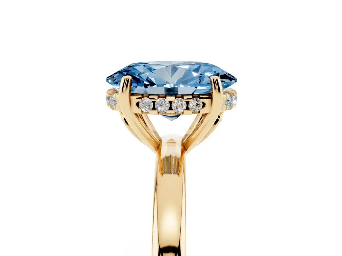 Fancy Blue Oval Cut Solitaire Diamond Ring with Prong Setting and Plain Band Yellow gold