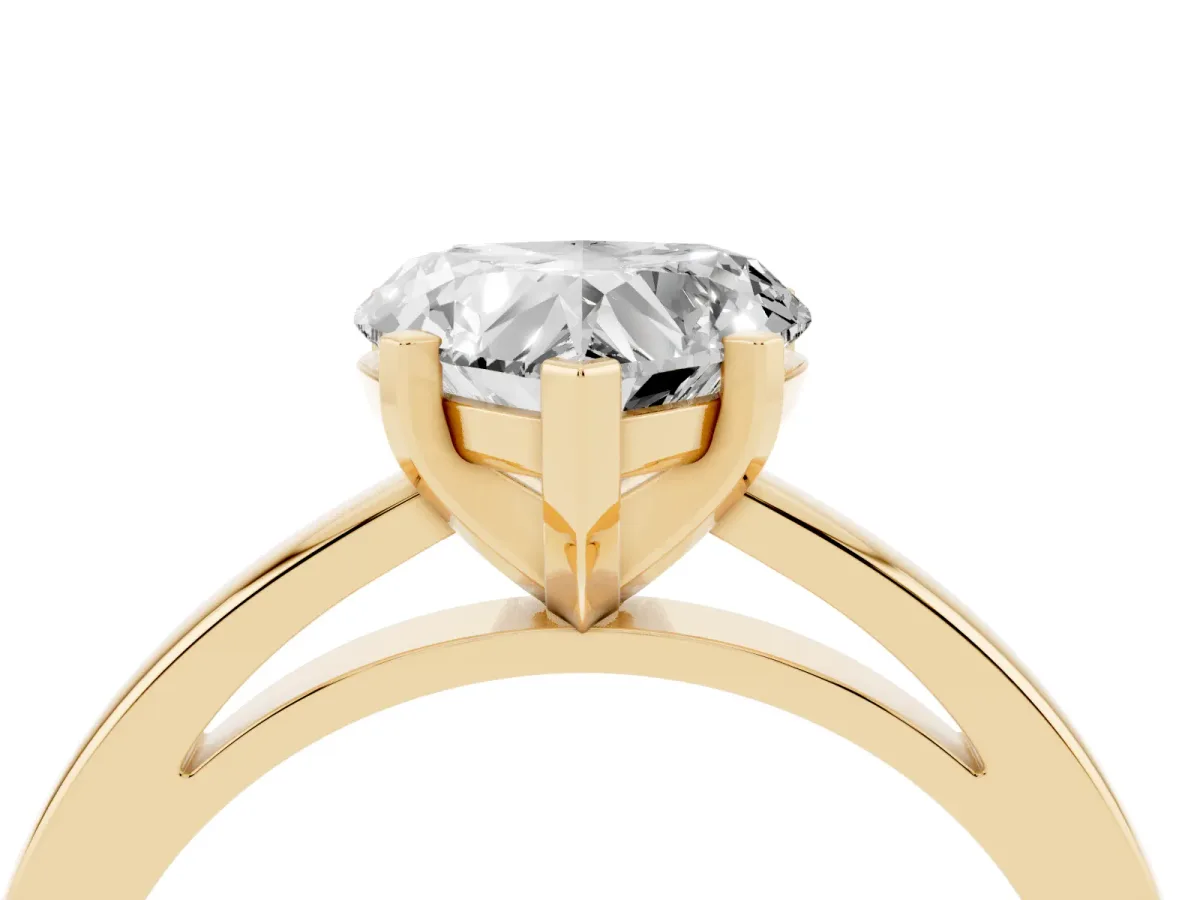 Heart Cut Solitaire Diamond Engagement Ring with Four-Prong Setting on a Classic Band Yellow gold