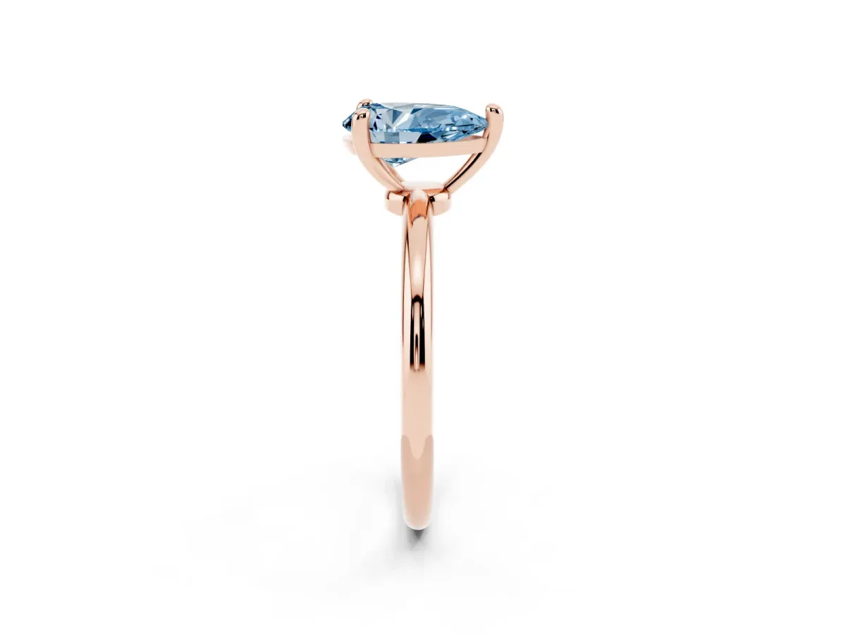Fancy Blue Pear Cut Solitaire Diamond Ring with 4-Prong Setting on a Classic Band Rose gold