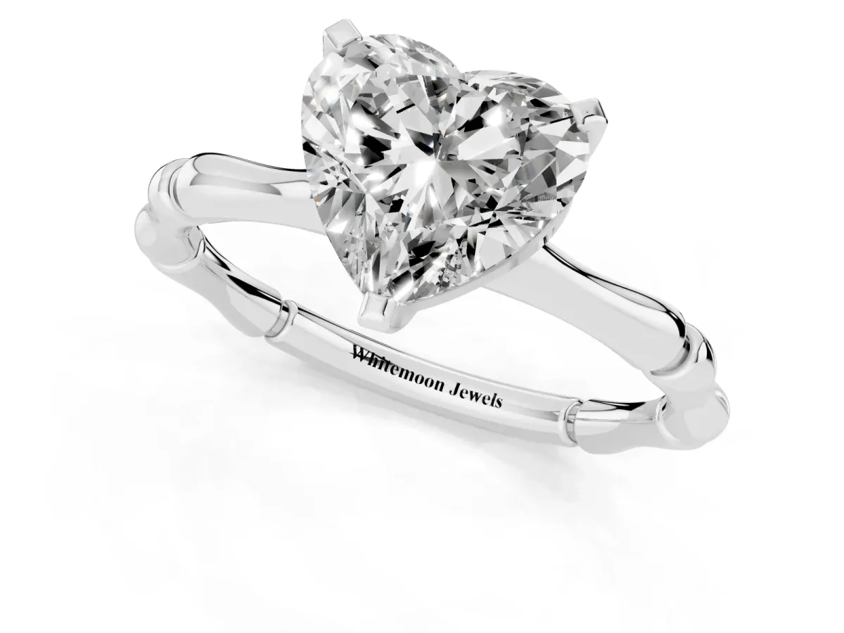 Heart Cut Solitaire Diamond Ring with Bamboo Band and Four-Prong Setting Platinum