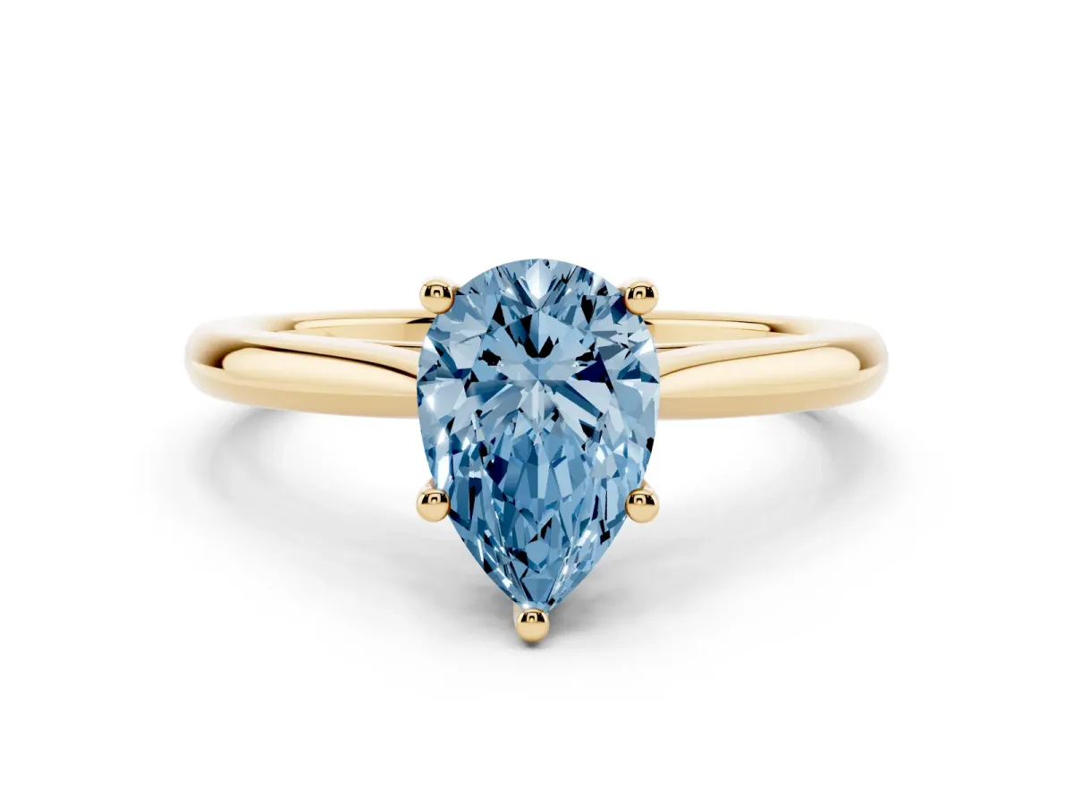 Fancy Blue Pear Cut Cut Solitaire Ring with Cathedral Band and Four-Prong Setting Yellow gold