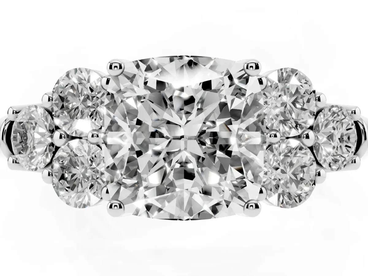 Cushion Cut Cut Diamond Cluster Ring with Round Accent Stones and Prong Setting on a Classic Band Silver