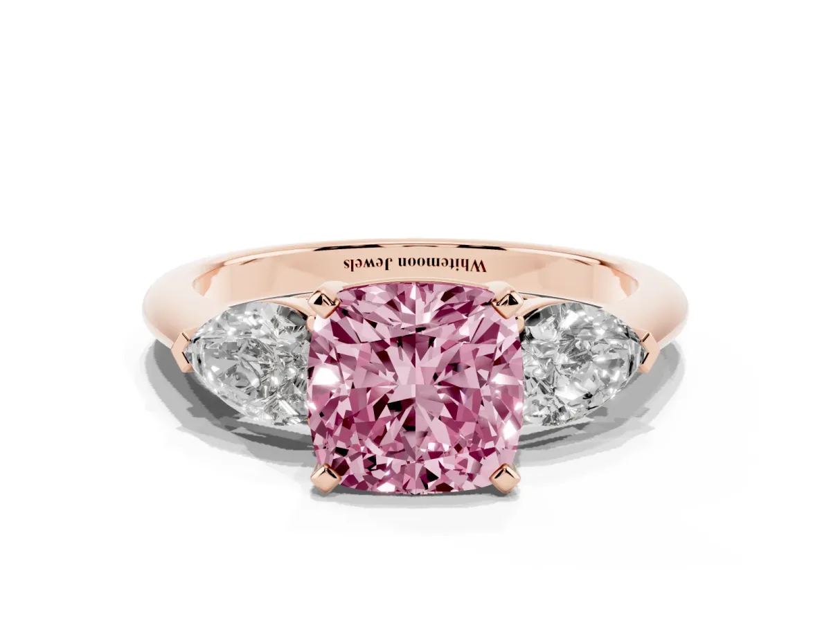 Fancy Pink Three-Stone Cushion Cut Diamond Ring with Pear Side Stones and Four-Prong Setting Rose gold