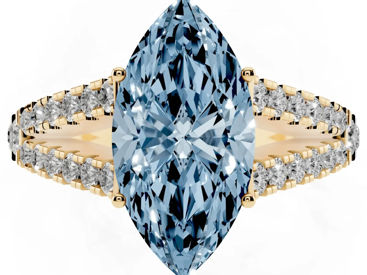 Fancy Blue Marquise Cut Diamond Split Shank Pavé Engagement Ring with Four-Prong Setting Yellow gold