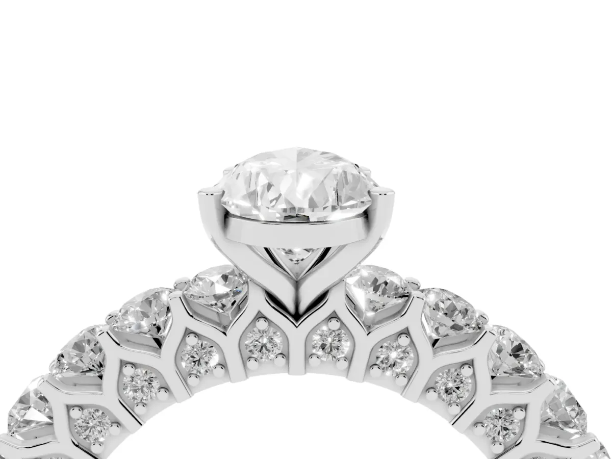Pear Cut Diamond Solitaire Ring with Shared Prong Pavé Band and Four-Prong Setting Silver