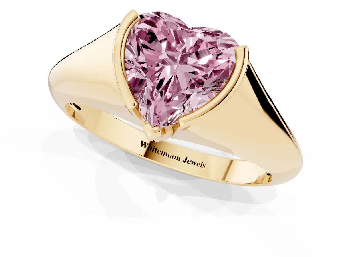 Fancy Pink Heart Cut Solitaire Tension Set Diamond Ring Yellow gold